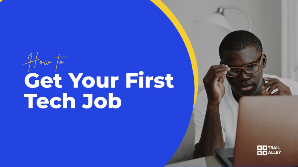 Image showing a man with his laptop with a text overlay of how to get your first tech job
